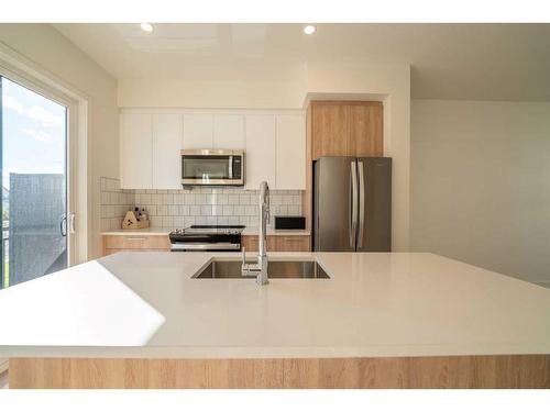 504-857 Belmont Drive Sw, Calgary, AB - Indoor Photo Showing Kitchen With Upgraded Kitchen