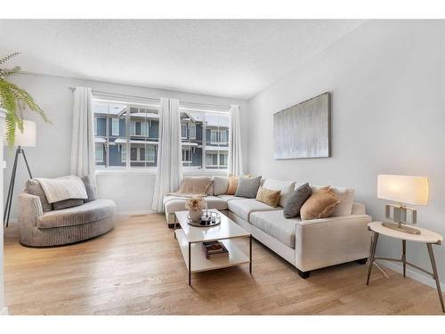 26 Kinlea Common Nw, Calgary, AB - Indoor Photo Showing Living Room