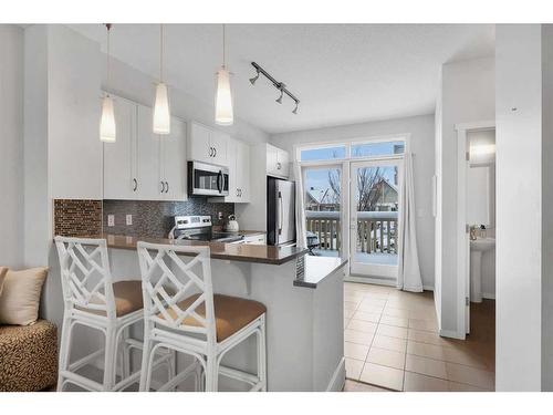 26 Kinlea Common Nw, Calgary, AB - Indoor Photo Showing Kitchen With Upgraded Kitchen