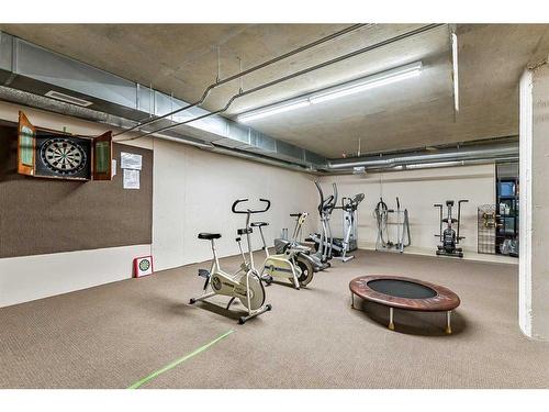 1302-200 Community Way, Okotoks, AB - Indoor Photo Showing Gym Room