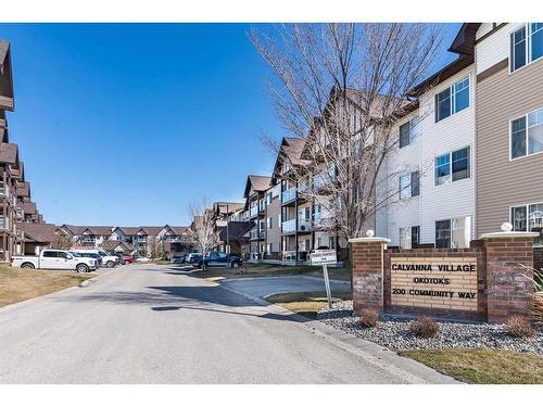 1302-200 Community Way, Okotoks, AB - Outdoor With Facade