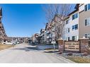 1302-200 Community Way, Okotoks, AB  - Outdoor With Facade 