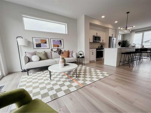 83 Arbour Lake Court Nw, Calgary, AB - Indoor Photo Showing Living Room