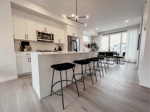 83 Arbour Lake Court Nw, Calgary, AB - Indoor Photo Showing Kitchen With Upgraded Kitchen