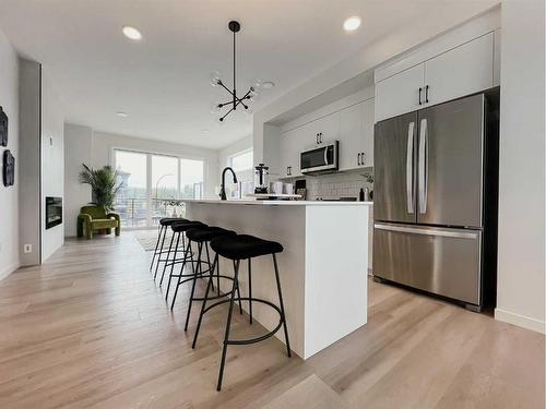 83 Arbour Lake Court Nw, Calgary, AB - Indoor Photo Showing Kitchen With Upgraded Kitchen