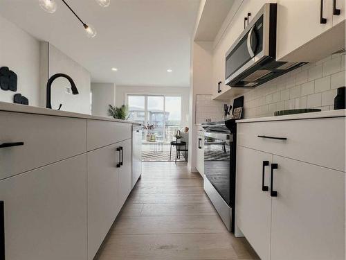 83 Arbour Lake Court Nw, Calgary, AB - Indoor Photo Showing Kitchen