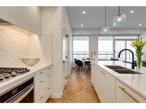 803-8505 Broadcast Avenue Sw, Calgary, AB - Indoor Photo Showing Kitchen With Double Sink With Upgraded Kitchen