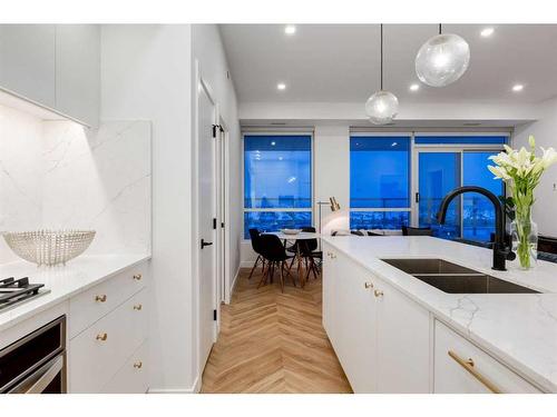 803-8505 Broadcast Avenue Sw, Calgary, AB - Indoor Photo Showing Kitchen With Double Sink With Upgraded Kitchen