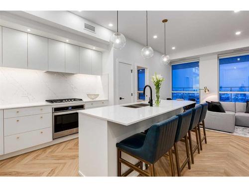 803-8505 Broadcast Avenue Sw, Calgary, AB - Indoor Photo Showing Kitchen With Double Sink With Upgraded Kitchen