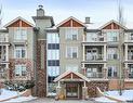 108-205 Sunset Drive, Cochrane, AB  - Outdoor With Facade 