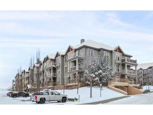 108-205 Sunset Drive, Cochrane, AB - Outdoor With Facade