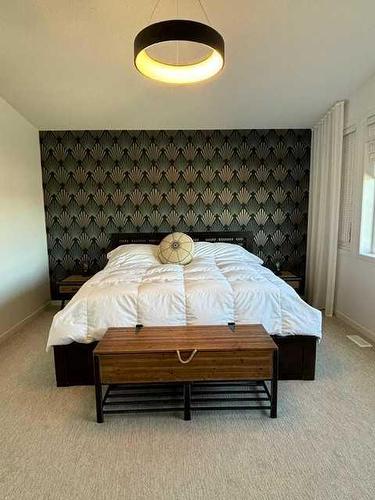 332 South Harmony Drive, Rural Rocky View County, AB - Indoor Photo Showing Bedroom