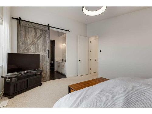 332 South Harmony Drive, Rural Rocky View County, AB - Indoor Photo Showing Bedroom