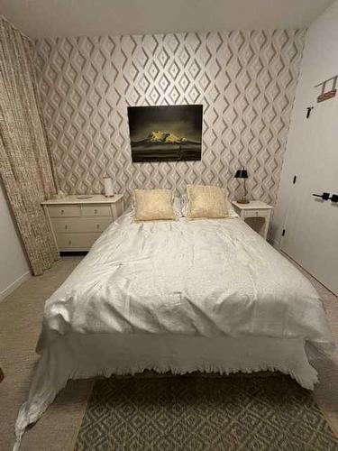 332 South Harmony Drive, Rural Rocky View County, AB - Indoor Photo Showing Bedroom