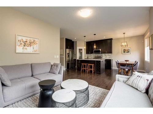 114 Sherwood Mount Nw, Calgary, AB - Indoor Photo Showing Living Room