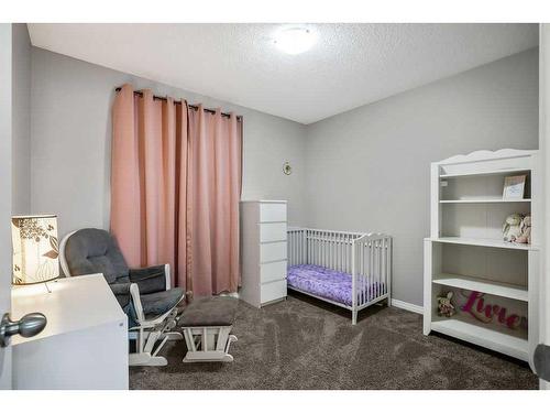 147 Auburn Bay Crescent Se, Calgary, AB - Indoor Photo Showing Bedroom