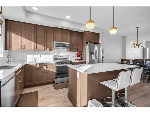 33 Silverton Glen Way Sw, Calgary, AB - Indoor Photo Showing Kitchen With Stainless Steel Kitchen With Upgraded Kitchen