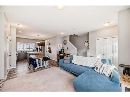 17 Belgian Lane, Cochrane, AB - Indoor Photo Showing Living Room