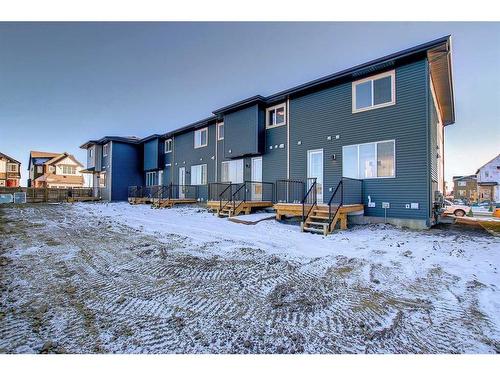 310 Sundown Road, Cochrane, AB - Outdoor With Exterior