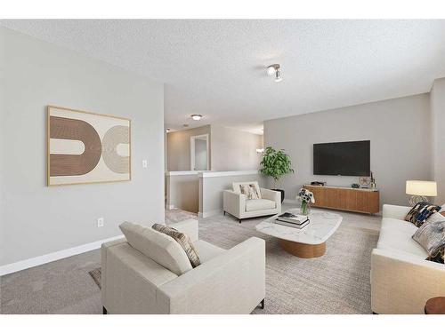 46 Chapman Close Se, Calgary, AB - Indoor Photo Showing Living Room