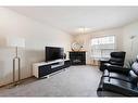 178 Mt Aberdeen Manor Se, Calgary, AB  - Indoor Photo Showing Living Room With Fireplace 