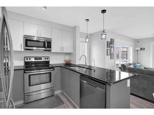 4214-240 Skyview Ranch Road Ne, Calgary, AB - Indoor Photo Showing Kitchen With Stainless Steel Kitchen With Double Sink With Upgraded Kitchen