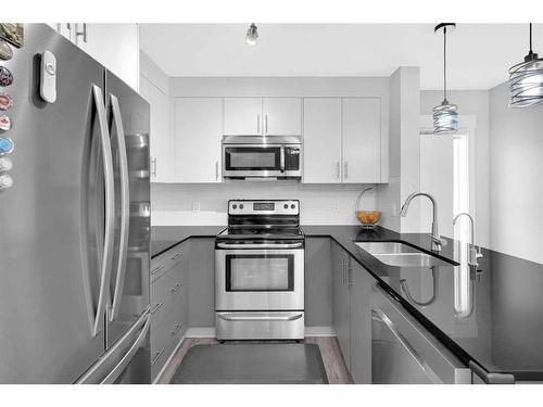 4214-240 Skyview Ranch Road Ne, Calgary, AB - Indoor Photo Showing Kitchen With Stainless Steel Kitchen With Double Sink With Upgraded Kitchen