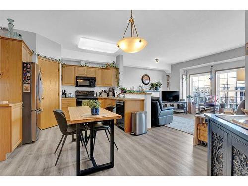 2460-151 Country Village Road Ne, Calgary, AB - Indoor Photo Showing Kitchen With Double Sink