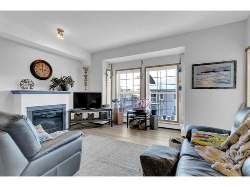 2460-151 Country Village Road Ne, Calgary, AB - Indoor Photo Showing Living Room With Fireplace