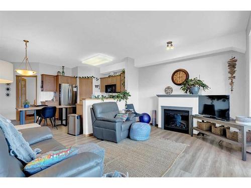 2460-151 Country Village Road Ne, Calgary, AB - Indoor Photo Showing Living Room With Fireplace