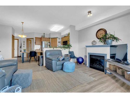 2460-151 Country Village Road Ne, Calgary, AB - Indoor Photo Showing Living Room With Fireplace