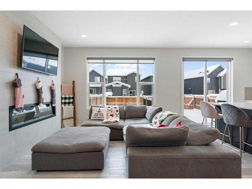 543 Belmont Heath Sw, Calgary, AB - Indoor Photo Showing Living Room