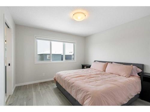 543 Belmont Heath Sw, Calgary, AB - Indoor Photo Showing Bedroom