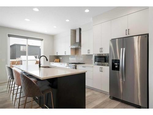 543 Belmont Heath Sw, Calgary, AB - Indoor Photo Showing Kitchen With Upgraded Kitchen