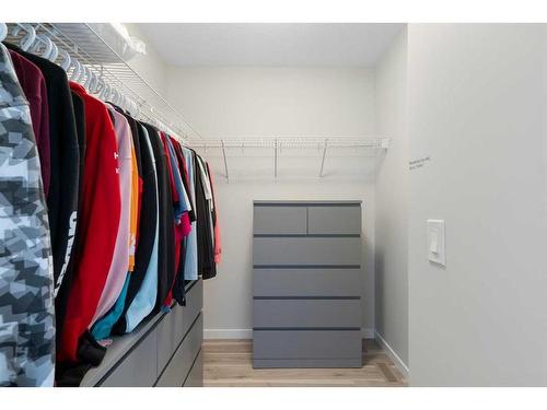 543 Belmont Heath Sw, Calgary, AB - Indoor With Storage