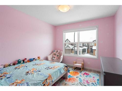 543 Belmont Heath Sw, Calgary, AB - Indoor Photo Showing Bedroom