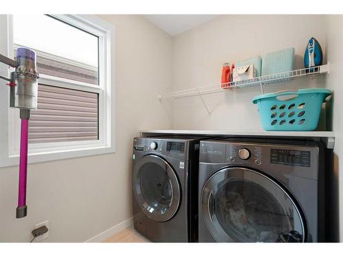 543 Belmont Heath Sw, Calgary, AB - Indoor Photo Showing Laundry Room