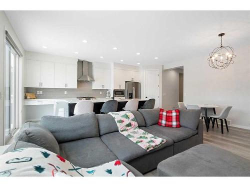 543 Belmont Heath Sw, Calgary, AB - Indoor Photo Showing Living Room