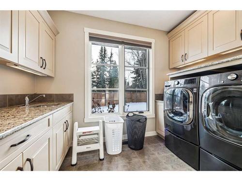 215 Patton Court Sw, Calgary, AB - Indoor Photo Showing Laundry Room