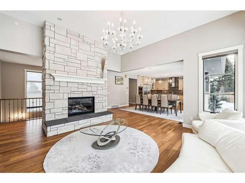 215 Patton Court Sw, Calgary, AB - Indoor Photo Showing Living Room With Fireplace