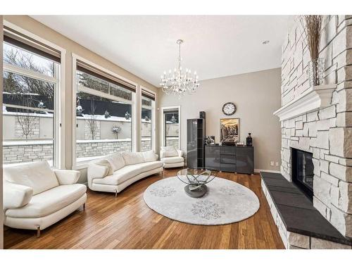 215 Patton Court Sw, Calgary, AB - Indoor Photo Showing Living Room With Fireplace