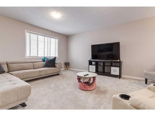 2 Evansbrooke Manor Nw, Calgary, AB - Indoor Photo Showing Living Room