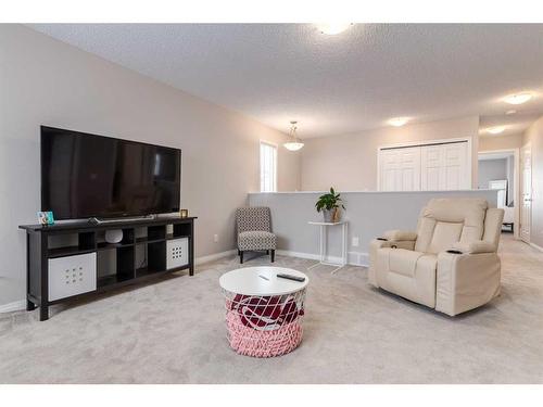 2 Evansbrooke Manor Nw, Calgary, AB - Indoor Photo Showing Living Room