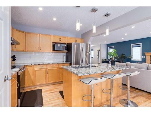 2 Evansbrooke Manor Nw, Calgary, AB - Indoor Photo Showing Kitchen With Stainless Steel Kitchen