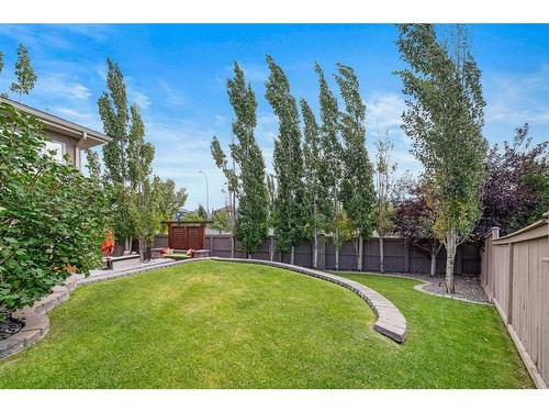 82 Everwillow Close Sw, Calgary, AB - Outdoor With Backyard