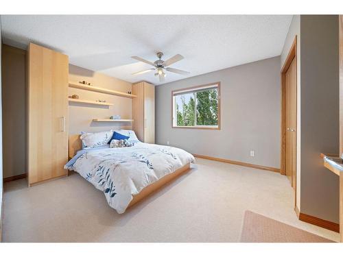 82 Everwillow Close Sw, Calgary, AB - Indoor Photo Showing Bedroom