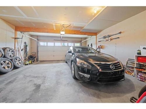 82 Everwillow Close Sw, Calgary, AB - Indoor Photo Showing Garage