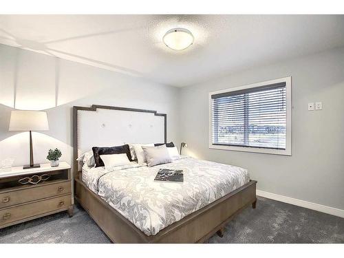 51 Lambeau Lane Se, Airdrie, AB - Indoor Photo Showing Bedroom