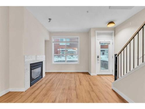 114-830 Centre Avenue Ne, Calgary, AB - Indoor With Fireplace