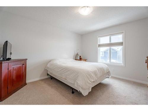 401 Clydesdale Way, Cochrane, AB - Indoor Photo Showing Bedroom